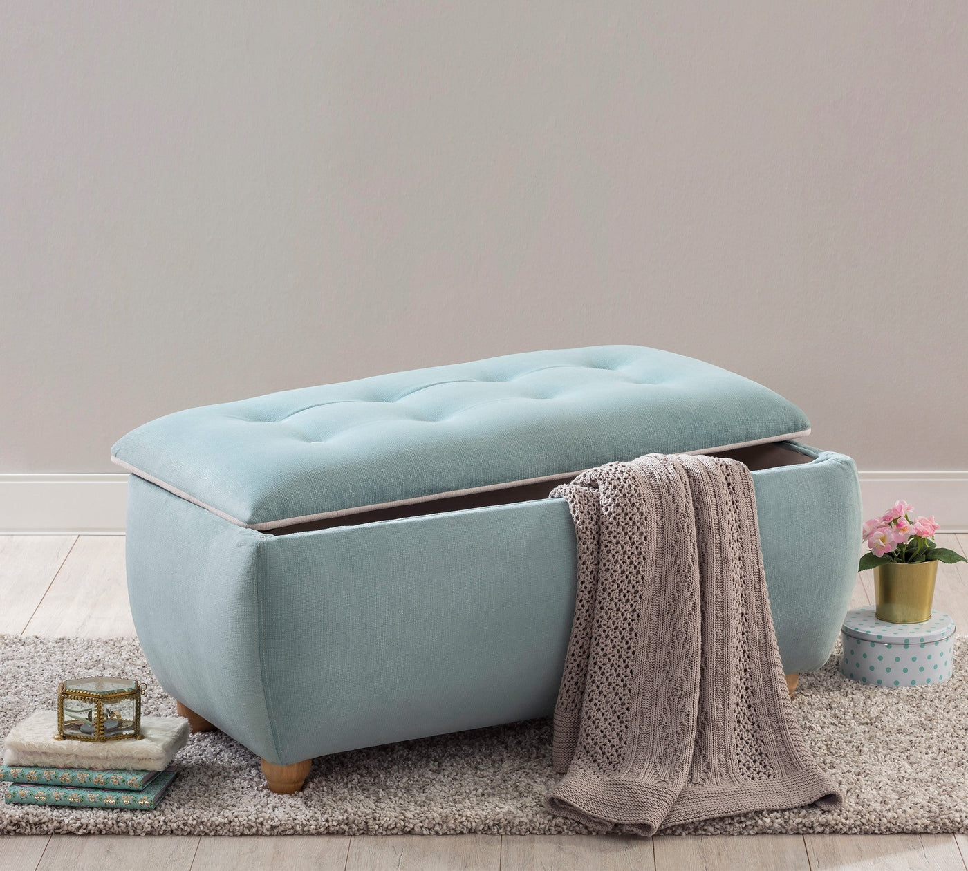 Blue pouf with storage