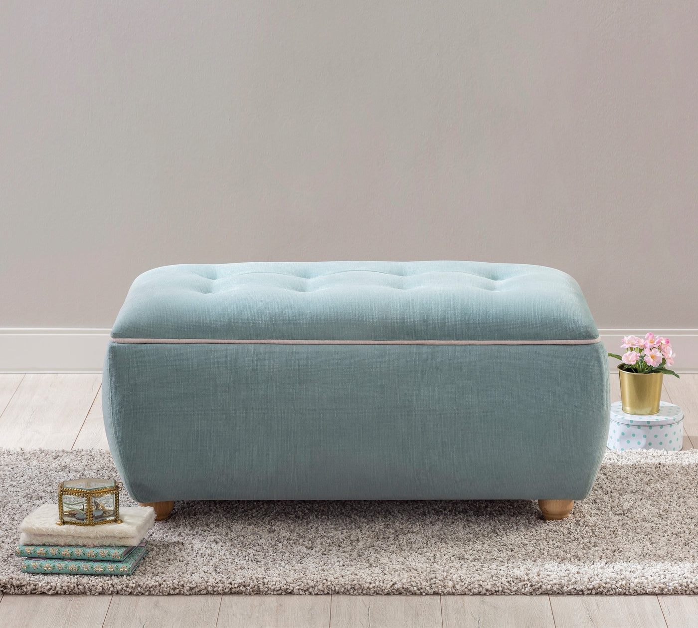 Blue pouf with storage